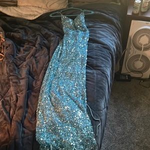 Trunk, light blue, primavera couture, originally $500, hemmed with button trunk.
